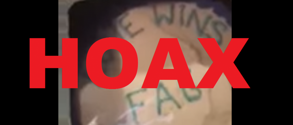 The 'Love Wins, Fag' cake allegedly sold to Pastor Jordan Brown by an Austin, Texas Whole Foods. Whole Foods says it is going to sue Brown for fraud. [YouTube screengrab/https://www.youtube.com/watch?v=p972qntg1qM]