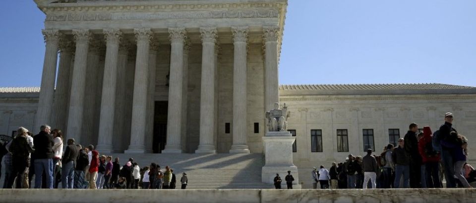People line up to visit U.S. Supreme Court after split 4-4 decision in first major case after Scalia death in Washington