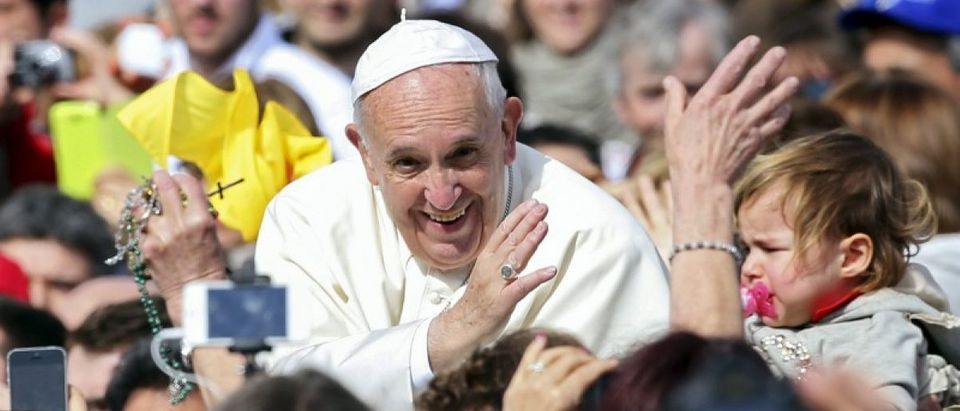 Pope Francis waves as he arrives at a Jubilee audience in Saint Peter's Square at the Vatican