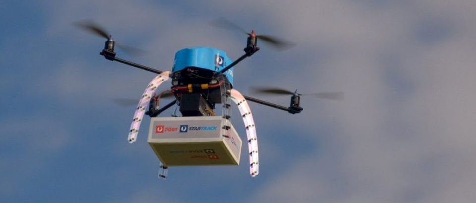 An Australia Post drone is pictured during trials of delivering packages from the air in this handout picture taken in Melbourne
