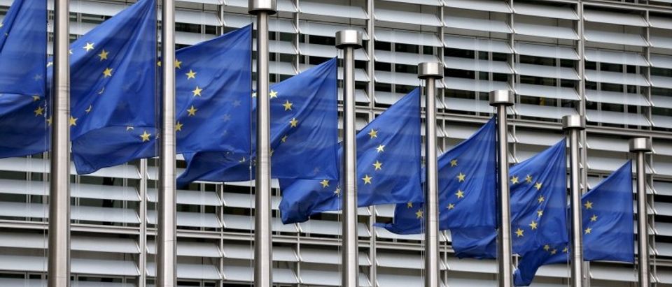 File picture shows European Union flags fluttering outside the EU Commission headquarters in Brussels