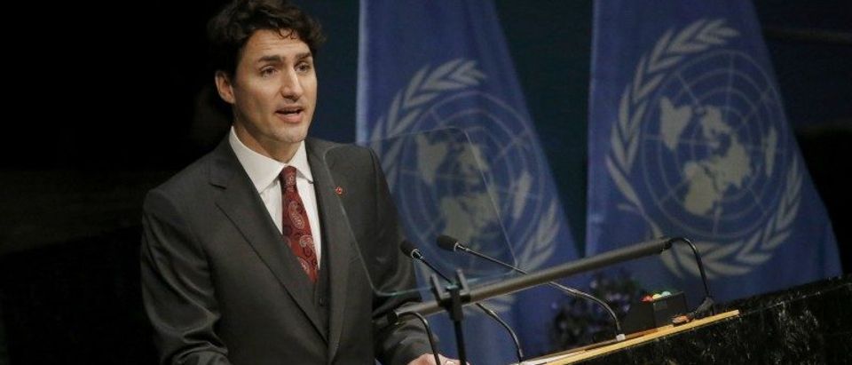 Canadian Prime Minister Justin Trudeau delivers his remarks during the signing ceremony on climate change held at the United Nations Headquarters in New York