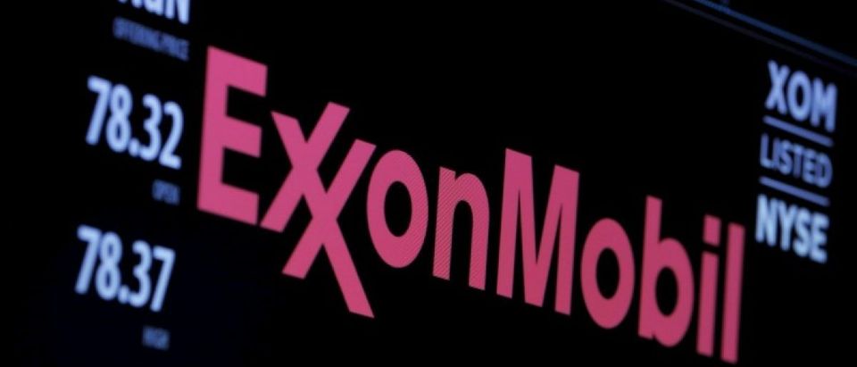 The logo of Exxon Mobil Corporation is shown on a monitor above the floor of the New York Stock Exchange in New York, December 30, 2015. REUTERS/Lucas Jackson/File Photo