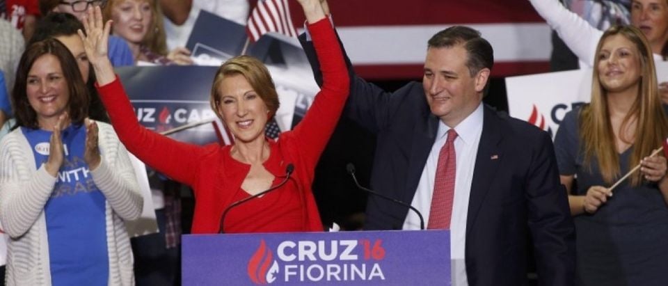 Republican U.S. presidential candidate Cruz stands with Fiorina at campaign rally in Indianapolis