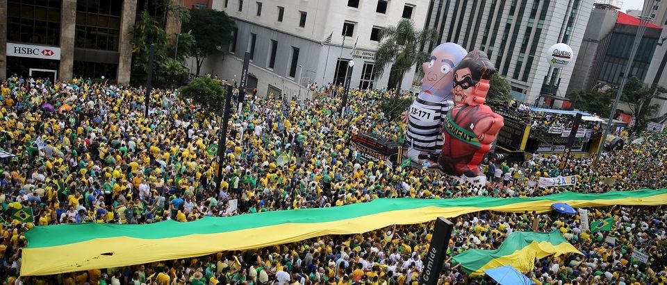 Inflatable dolls known as "Pixuleco" of Brazil's former President Luiz Lula da Silva and Brazil's President Rousseff are seen during a protest against Rousseff, part of nationwide protests calling for her impeachment, in Sao Paulo