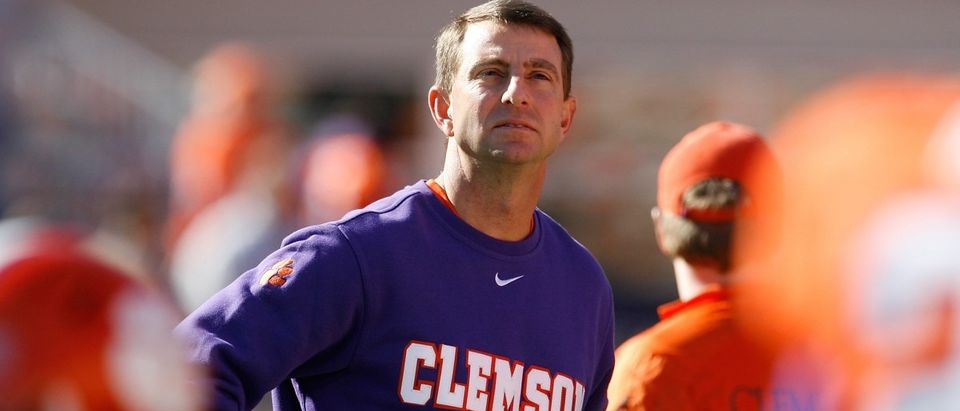 Head coach Dabo Swinney of the Clemson Tigers looks on prior to their game against the South Carolina Gamecocks at Memorial Stadium on Nov. 29, 2014 in Clemson, South Carolina. (Photo by Tyler Smith/Getty Images)