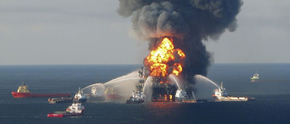 File photo of fire boat response crews battling the blazing remnants of the offshore oil rig Deepwater Horizon off Louisiana