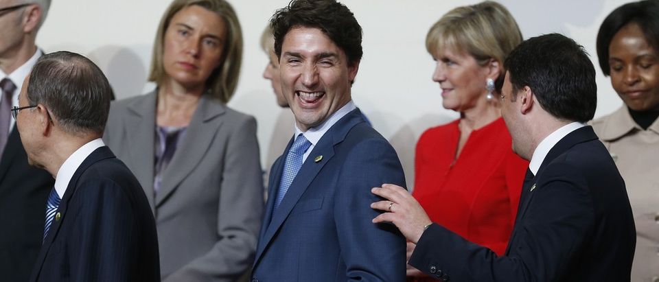 Canadian Prime Minister Trudeau reacts during family photo at the Nuclear Security Summit in Washington