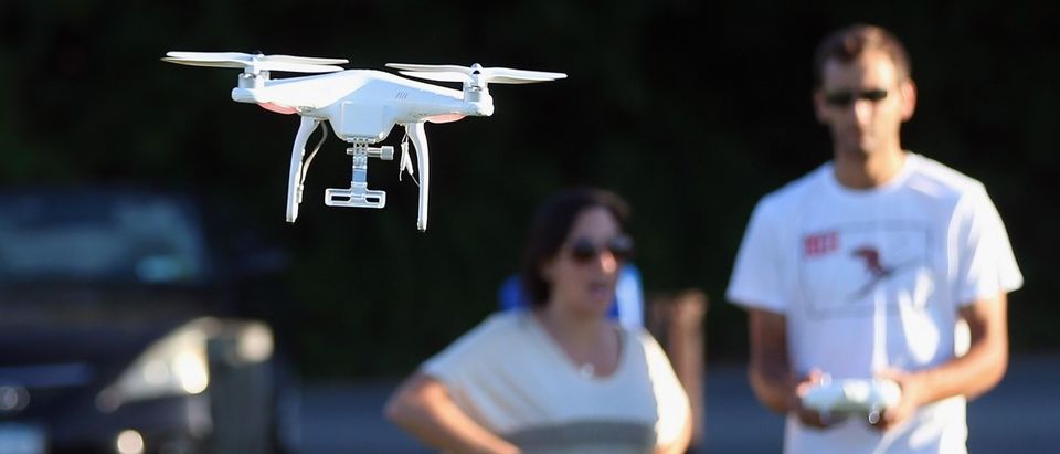 A drone is flown for recreational purposes in the sky above Syosset, New York on August 30, 2015. (Bruce Bennett/Getty Images)