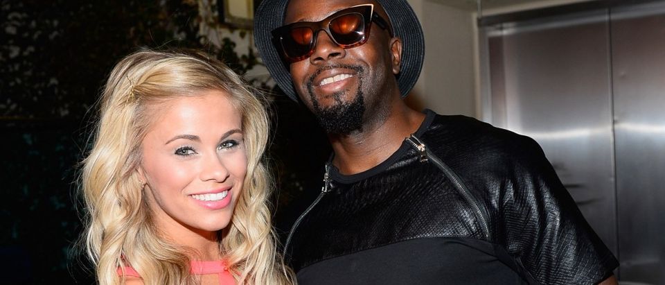 MMA fighter Paige VanZant and singer/songwriter Wyclef Jean at The Boulevard Pool at The Cosmopolitan of Las Vegas on July 9, 2015