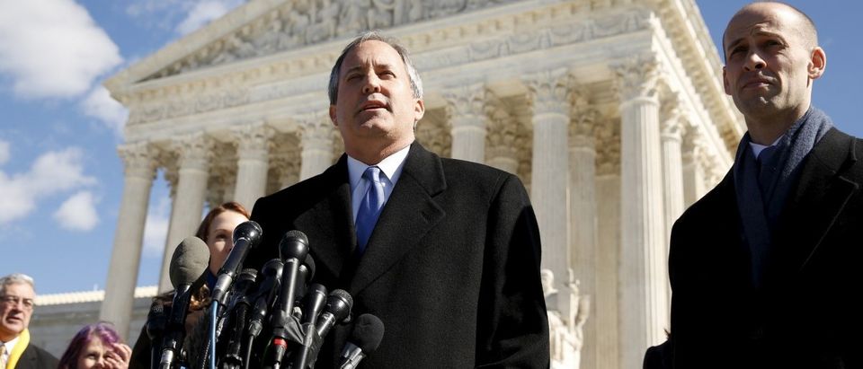 Texas Attorney General Ken Paxton addresses reporters on the steps of the U.S. Supreme Court in Washington