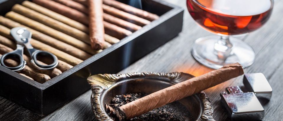 Aroma of cognac and burnig cigar
