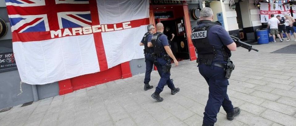 Police patrol near England fans ahead of their Euro 2016 soccer championship game in Marseille
