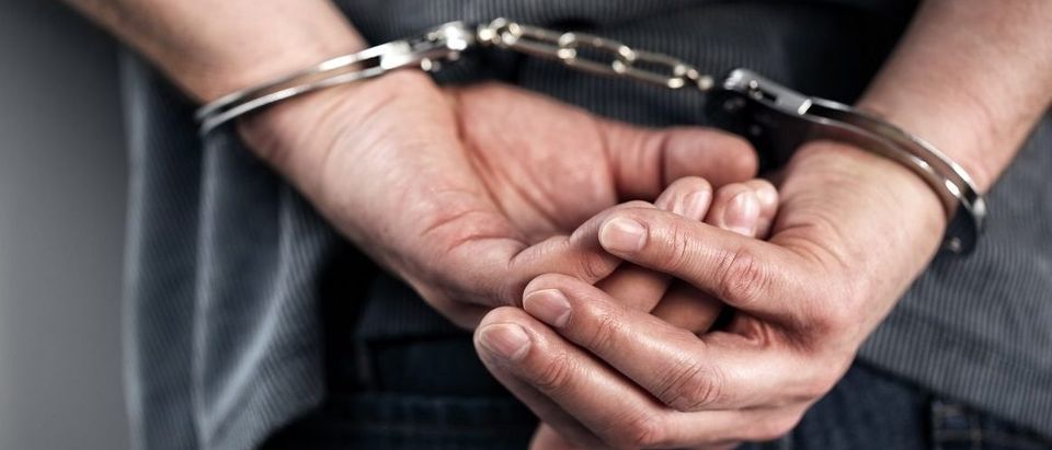 Man In Handcuffs (Shutterstock)