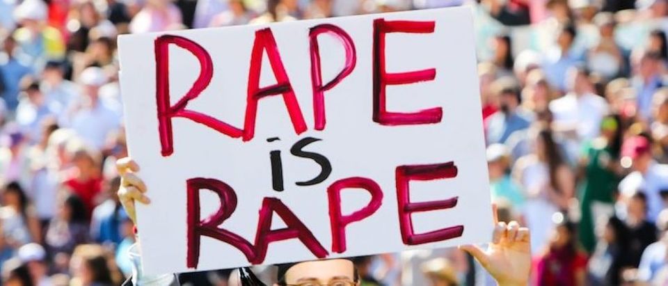Stanford student Paul Harrison supports a rape victim at his school