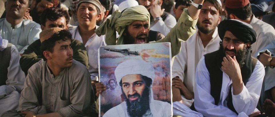 Supporters of Al Qaeda leader Osama bin Laden shout anti-American slogans, after the news of his death, during a rally in Quetta May 2, 2011. REUTERS/Naseer Ahmed