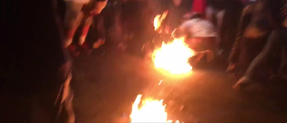 DNC protester accidentally setting himself on fire. [Twitter video screengrab/https://twitter.com/pacifictech808/status/758504323567394816]