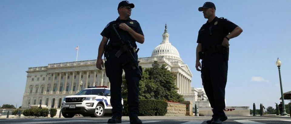 U.S. Capitol Police officers stand outside the Capitol after police ordered a lockdown in Washington