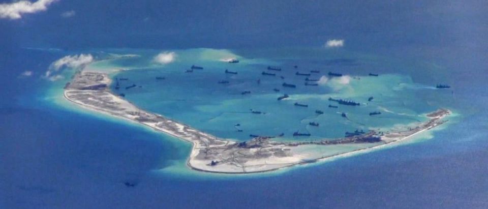 Still image from United States Navy video purportedly shows Chinese dredging vessels in the waters around Mischief Reef in the disputed Spratly Islands