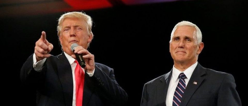 Republican presidential candidate Donald Trump and vice presidential candidate Mike Pence speak at a campaign event in Roanoke