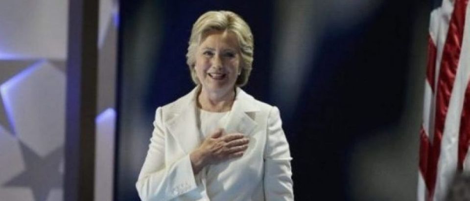 Democratic presidential nominee Hillary Clinton places her hand on her heart as she arrives onstage at the Democratic National Convention in Philadelphia, Pennsylvania