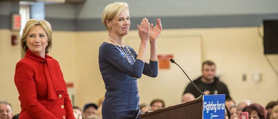 Cecile Richards (R) introduces Democratic presidential candidate Hillary Clinton at a campaign event with (2nd R), president of Planned Parenthood, at Buford Garner Elementary School on January 24, 2016 in North Liberty, Iowa. (Brendan Hoffman/Getty Images)