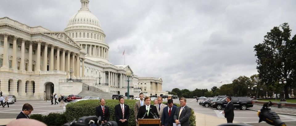 U.S. Representatives Fleming leads a news conference with fellow House Republicans to voice their opposition to funding Obamacare, in Washington