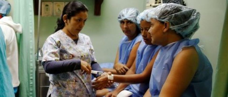 The Wider Image: In crisis-hit Venezuela young women seek sterilization