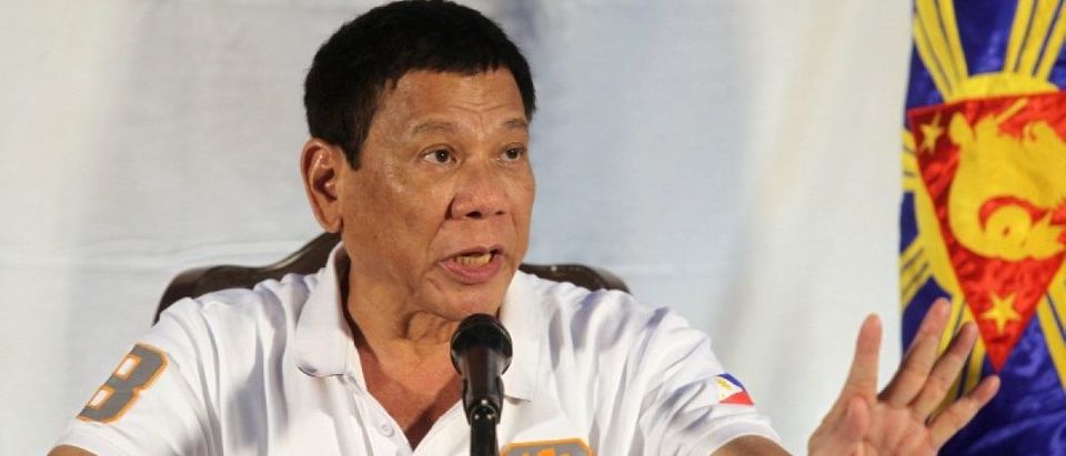 Philippine President Rodrigo Duterte speaks during a news conference in Davao