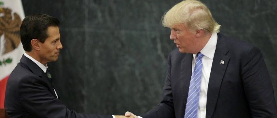 U.S. presidential nominee Trump and Mexico's President Pena Nieto shake hands in Mexico City