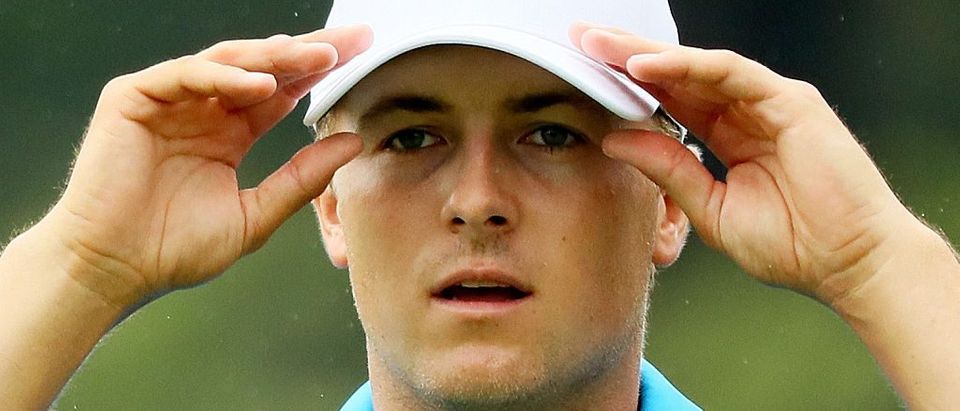 Jordan Spieth of the United States reacts on the 18th green during the continuation of the weather delayed third round of the 2016 PGA Championship at Baltusrol Golf Club on July 31, 2016 in Springfield, New Jersey