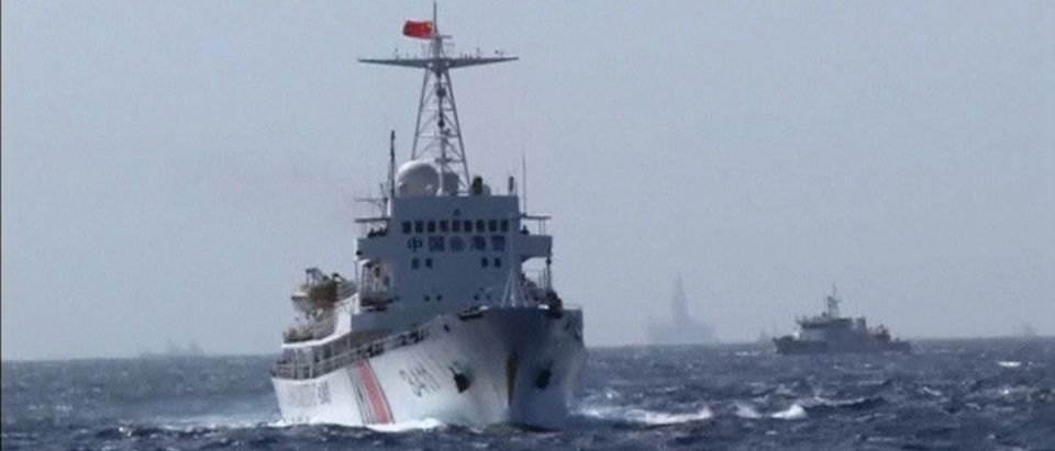 A still image taken from video shows a Chinese Coast Guard vessel sailing in the South China Sea