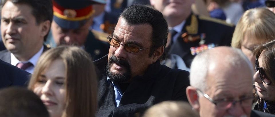 U.S. actor Steven Seagal waits for the Victory Day parade at Red Square in Moscow, Russia, May 9, 2015. Russia marks the 70th anniversary of the end of World War Two in Europe on Saturday with a military parade, showcasing new military hardware at a time when relations with the West have hit lows not seen since the Cold War. REUTERS/Host Photo Agency/RIA Novosti