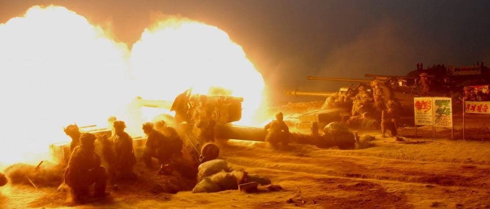 Korean People's Army (KPA) artillery troops conduct a live firing exercise
