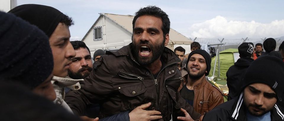 Migrants fight between themselves near the Greek-Macedonian border, near the village of Idomeni