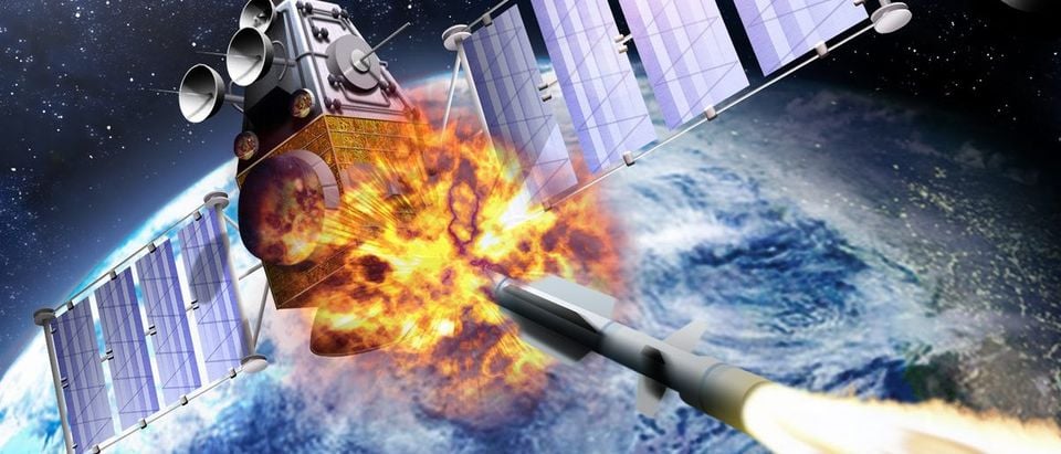 A SM-3 missile smashing into a spy satellite. (Shutterstock/edobric )