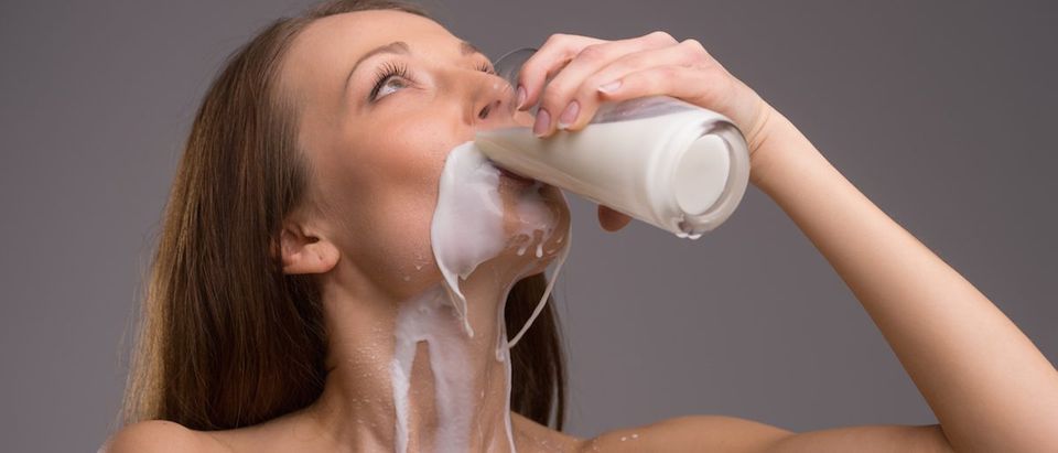 White Woman Drinks Milk