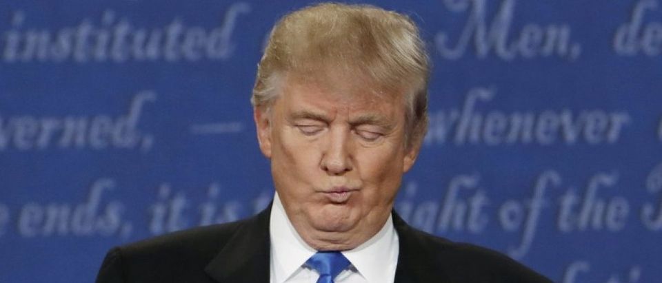 Republican U.S. presidential nominee Donald Trump reacts during first presidential debate at Hofstra University in Hempstead