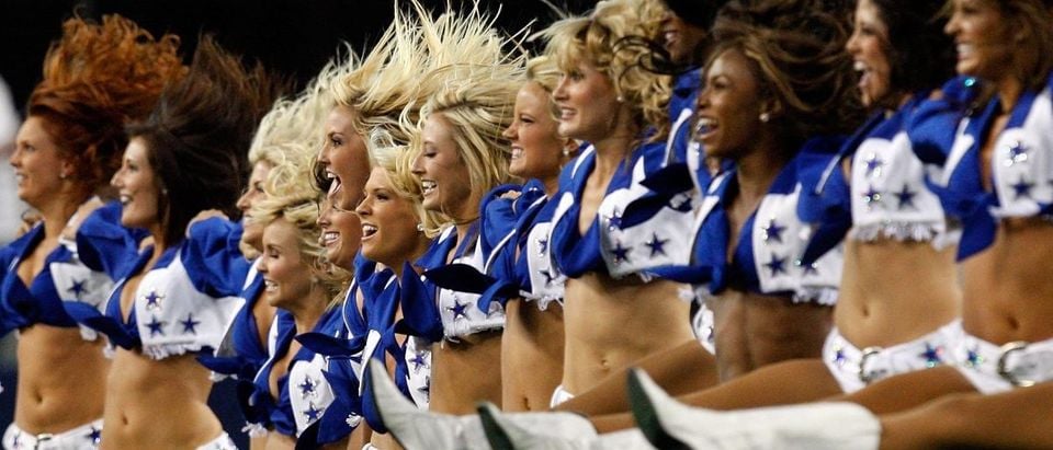 The Dallas Cowboys cheerleaders perform at Cowboys Stadium on August 29, 2009 in Arlington, Texas