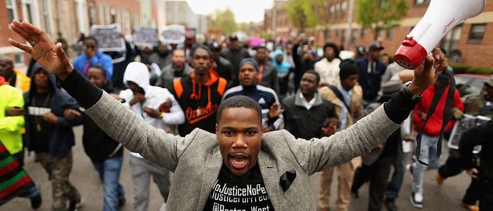 Hundreds of demonstrators march toward the Baltimore Police Western District station during a protest against police brutality and the death of Freddie Gray in the Sandtown neighborhood April 22, 2015 in Baltimore, Md