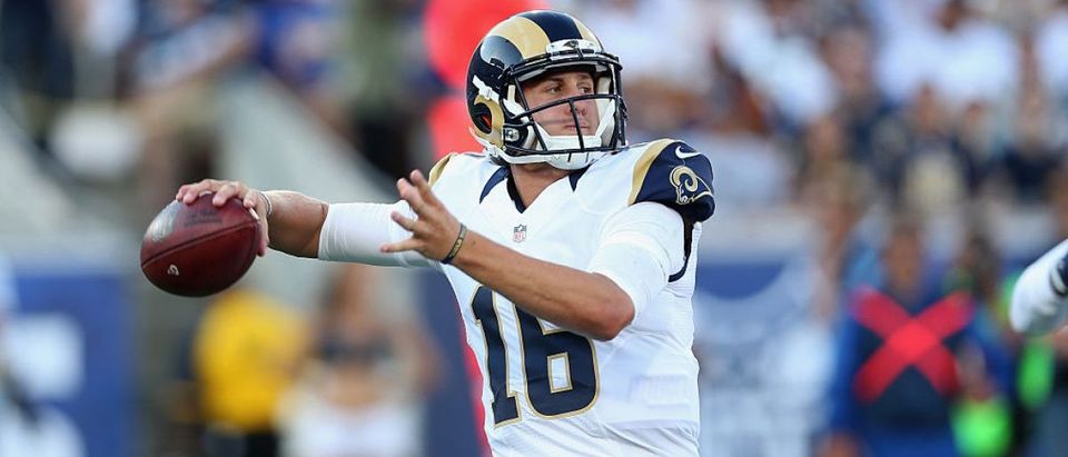 Quarterback Jared Goff #16 of the Los Angeles Rams throws a pass against the Dallas Cowboys at the Los Angeles Coliseum during preseason on August 13, 2016 in Los Angeles