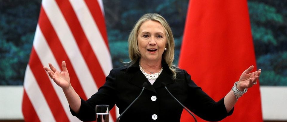 U.S. Secretary of State Clinton attends a news conference in Beijing