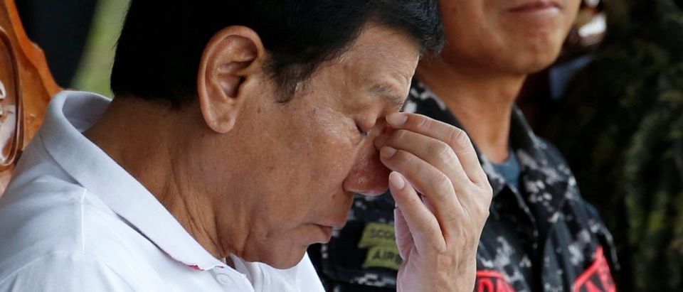 Philippine President Rodrigo Duterte reacts during a visit at the military's Scout Ranger Camp Tecson in San Miguel, Bulacan in northern Philippines September 15, 2016. REUTERS/Erik De Castro
