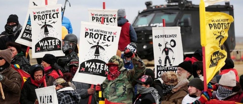 Dakota Access Pipeline protesters square off against police near the Standing Rock Reservation and the pipeline route outside the little town of Saint Anthony