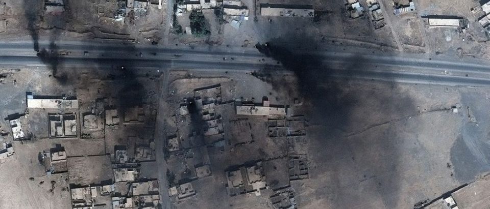 Smoke is seen in this satellite image of the city of Mosul in Iraq