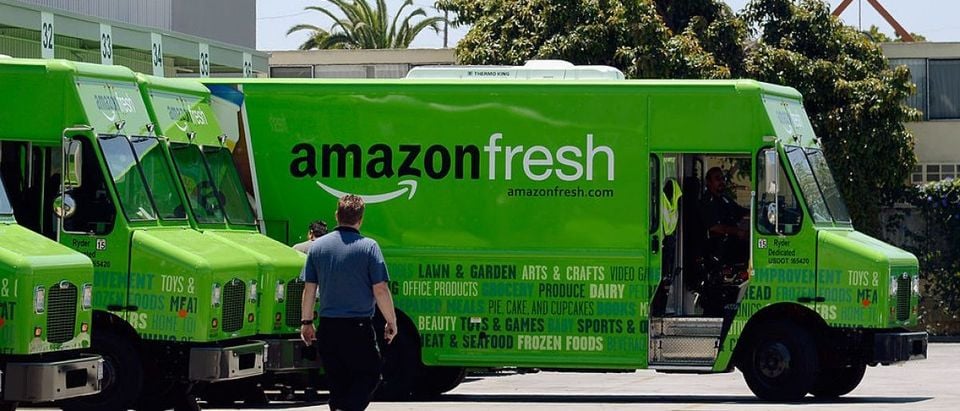 INGLEWOOD, CA - JUNE 27: An Amazon Fresh truck arrives at a warehouse. AmazonFresh lets you order groceries and have them delivered on the same day. (Photo by Kevork Djansezian/Getty Images)