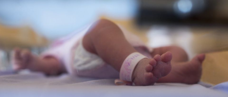 A picture shows the feet of a new-born at the maternity of the Argenteuil hospital, in a Paris suburb, on July 22, 2013. (FRED DUFOUR/AFP/Getty Images)