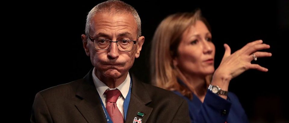 Hillary Clinton's Campaign Chairman John Podesta looks on prior to the start of the Presidential Debate at Hofstra University (Photo by Drew Angerer/Getty Images)