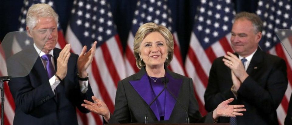 Democratic presidential candidate Hillary Clinton, husband, former U.S. President Bill Clinton, and VP nominee Kaine, applaud her concession speech in New York
