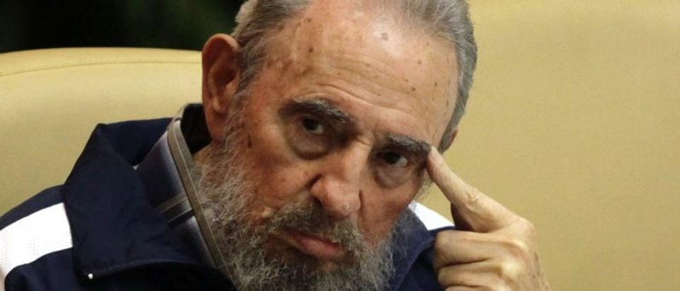 Former Cuban leader Fidel Castro attends the closing ceremony of the sixth Cuban Communist Party (PCC) congress in Havana